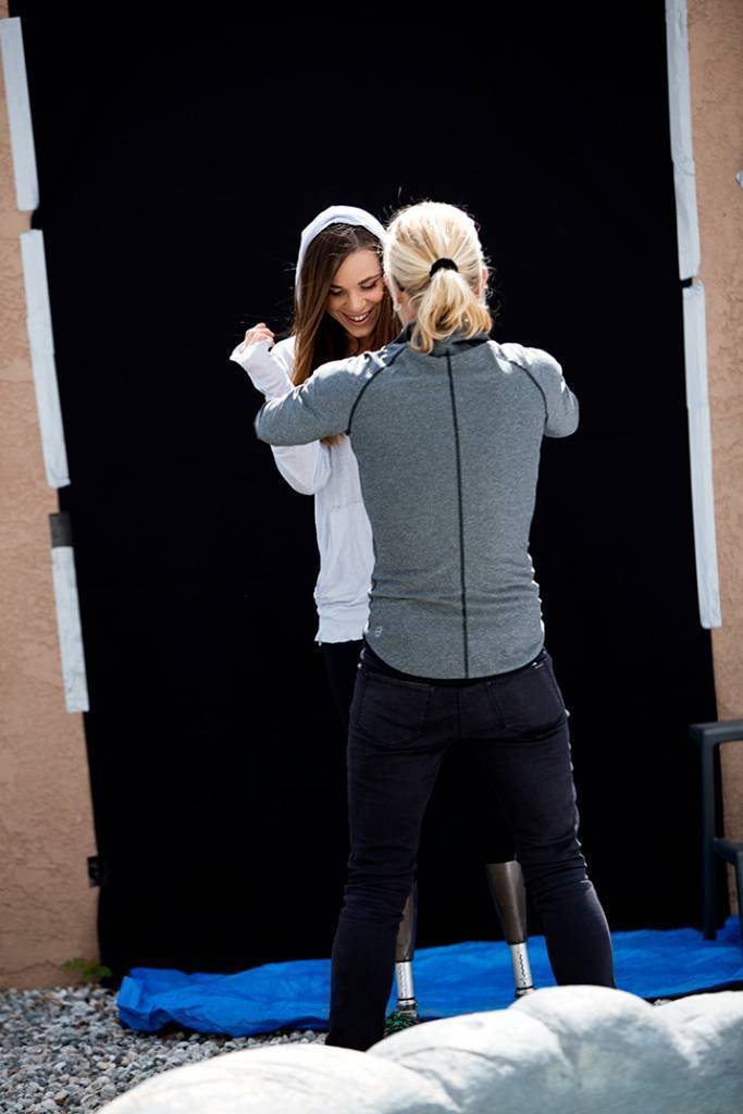 Photo of Oksana working with a new set of prosthetic legs.